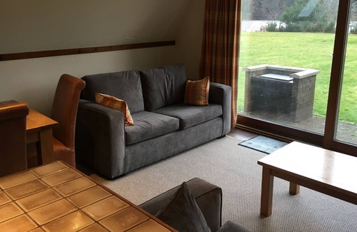 South Laggan Apartment | A Frame lodge with amazing loch views on the bank-side of Loch Oich