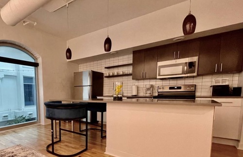Old Market Apartment | A historic 700 square foot Atrium loft in the heart of the Old Market