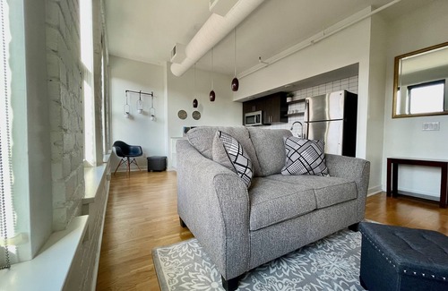 Downtown Omaha Apartment | A historic 900 square foot Atrium loft in the heart of the Old Market