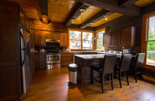 Lac-Superieur Ski Chalet | A large & cozy cabin with private spa and fireplace by Mont Tremblant