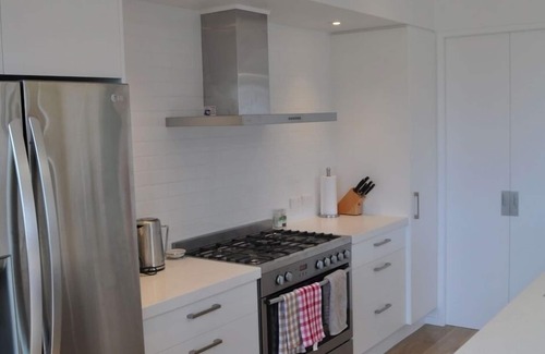 Omaha House | A modern 4-bedroom bach made for easy sharing