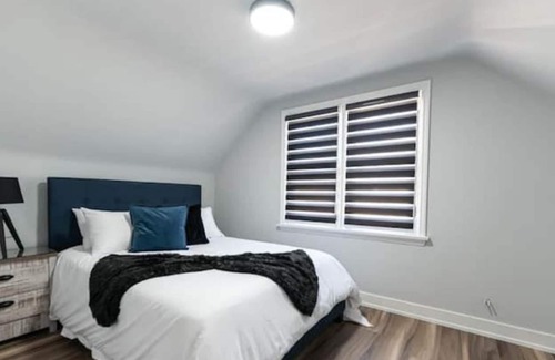 St. Catharines House | A Modern Home Sleek Design & Secondary Suite