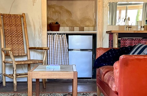 Cornville House | A private king studio with a kitchenette in the garden of Halliday House.