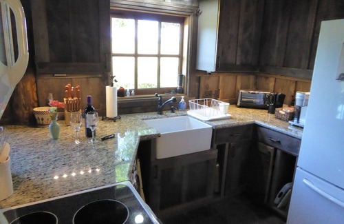 Palestine Cottage | A rustic stone cottage on an estate close to the Texas State Railroad.