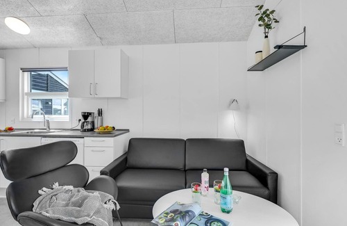 Assens House | A small cottage awaits you here, located on a campsite with a playground.