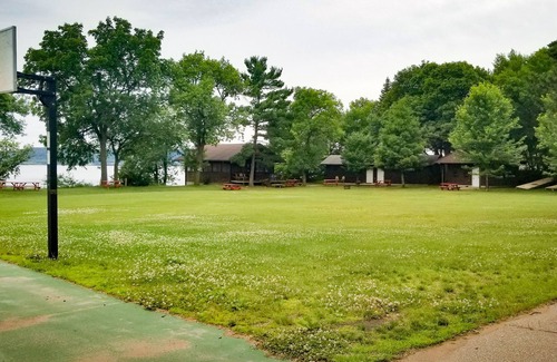 Pepin County Cabin | A summer camp cabin with attached bath and lounge area