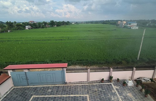 Bharatpur House | A two-bedroom home with a living room, kitchen, and garden feels like home.n