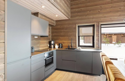 Kviteseid House | A unique and modernly furnished holiday villa! Quietly located with a view of Lake Vråvatn. Suitable for 8 people.
