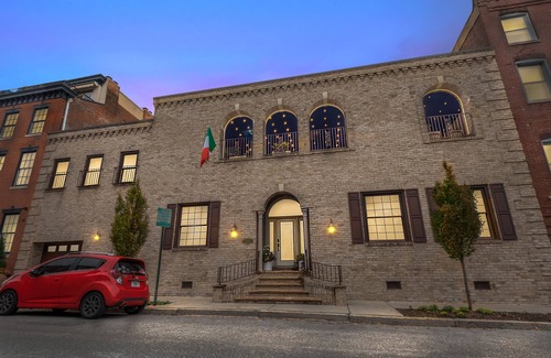 Downtown Baltimore Villa | A Villa Steps from Harbor East with Indoor Pool and 4-Car Parking Sleeps 12