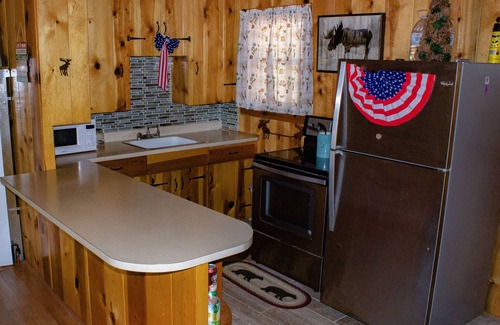 Greer Cabin | A Yogi Bear Cabin nestled in the PInes