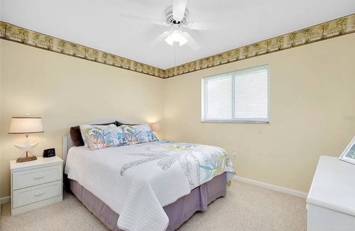 Pebble Beach House | ABSOLUTELY GORGEOUS CANAL HOME WITH HEATED INGROUND POOL ON A QUIET STREET!