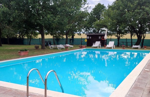 Casalini Apartment | Accogliente Appartamento in Antico Casolare con Piscina Condivisa