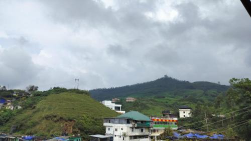 Munnar Hotel | Achus Inn