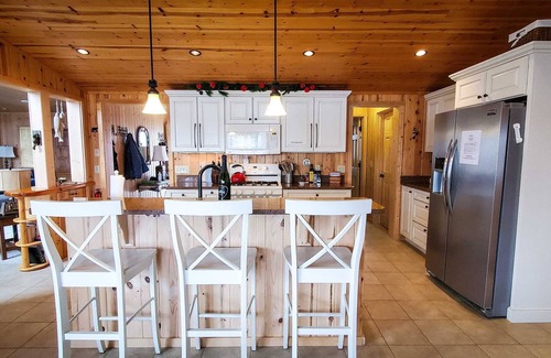 Cheboygan House | Acorn Landing: Experience Fall's Foliage from Your Lakeside Retreat!
