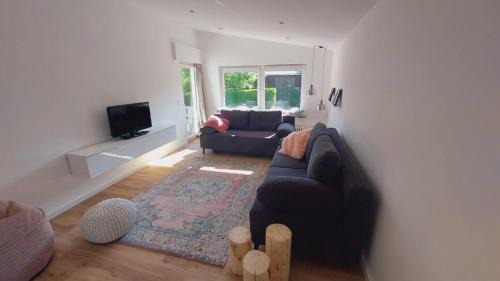 Hillesheim House | Adenauer Zwölf - Das 5 Sterne Ferienhaus mit Sauna und Garten am Eifelsteig