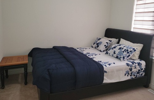 Brampton House | Adig comfortable Bedroom in Brampton .