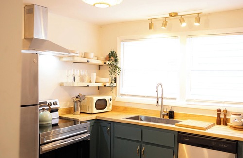 Glen Iris House | Adorable Home Close to UAB with King Beds and Great Neighborhood