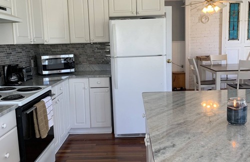 Mayo House | Adorable waterside cottage with pool Beach community