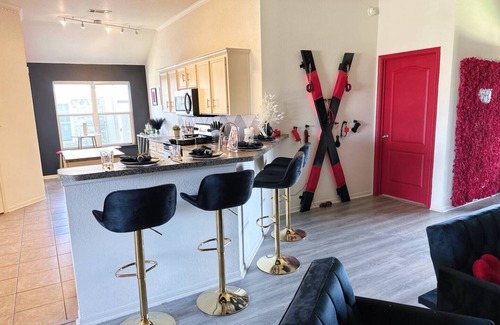 Killeen House | Adult-only kink-friendly getaway with Jacuzzi spa, king bed, custom play furniture, massage table, and LED mood lighting. Ideal for romantic escapes, adventurous weekends, or indulgent celebrations in total privacy.
