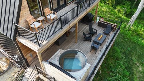 Beloit House | Aframe River Retreat, Sauna, Hot Tub, Workspace, New Build!