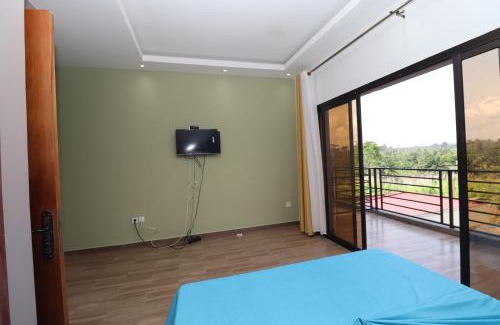 Kribi Apartment | AfriqPnB RF2 Chambre Mvog Ekoussou avec Piscine