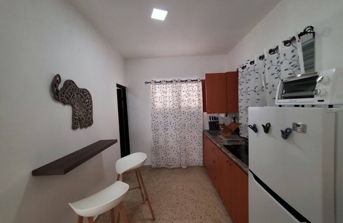 Borinquen Apartment | Aguadilla Surfers Lair Apt. with electricity,water A/C WIFI near Crashboat beach