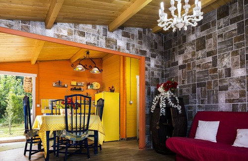 Nizza di Sicilia Ski Chalet | Air-conditioned chalets with a swimming pool, Wi-fi, TV, washing machine, family and animals