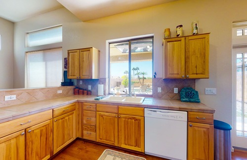 Palm Valley House | Airy home with private heated pool, firepit, grill, enclosed backyard, cornhole