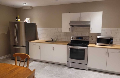 Pickering Apartment | Airy, spacious, nature facing walk-out suite