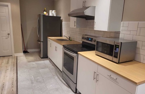 Pickering Apartment | Airy, spacious, nature facing walk-out suite