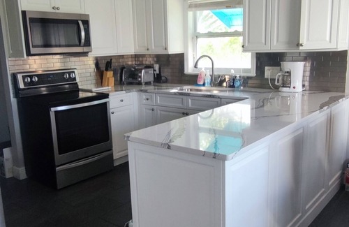 Riverview House | Alafia River waterfront house with pool & dock