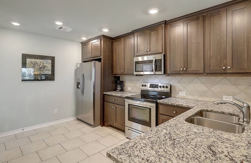 Rockport House | All-suite bay-view home with yard, kayak, & rooftop deck with panoramic views