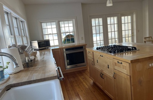 Breezy Point House | All the coastal vibes of Nantucket & 600 ft of shoreline on Lake Ossawinnamakee