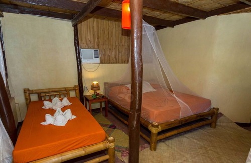 Abra de Ilog Resort | AMAMI BEACH RESORT, native style 20mt from the seashore