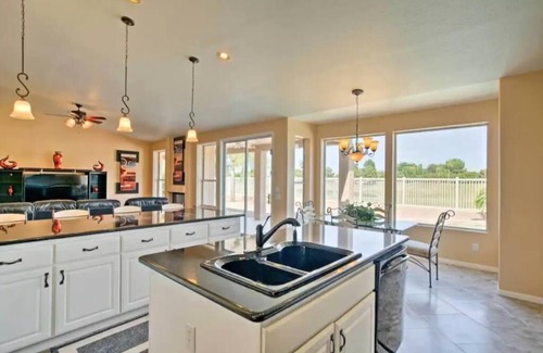 Ironwood House | Amazing luxury home on golf course, beautiful water view, private heated pool!