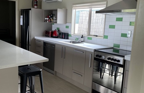 Whangamata House | Amazing Modern Open Plan Bach walk to beach or townnSleeps 8 - large sunny deck