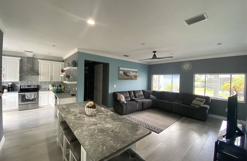 Greater Palm River Point CDC House | Amazing waterfront vacation home in Tampa -Gated, Heated pool