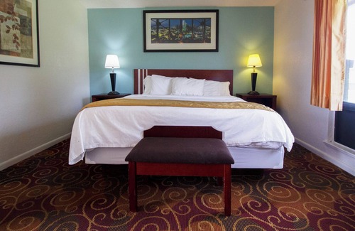 Perry Hotel | American Best Inn By OYO I-35 Perry near Lake McMurtry