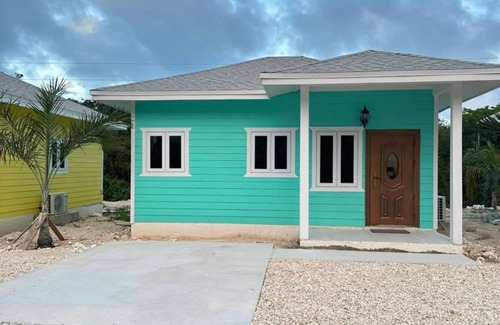 Great Exuma Cottage | Anchor Villa: 5 min walk or rent a bike to go to turtle beach.