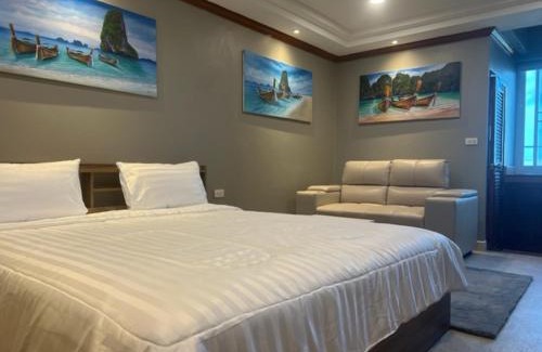 Patong Apartment | Andaman Sea Apartments near Patong Beach - 28 SQM with Kitchen, Private Bathroom, Seating Area, 65" Smart TV with Free WIFI
