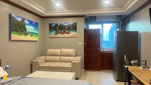 Patong Apartment | Andaman Sea Apartments near Patong Beach - 28 SQM with Kitchen, Private Bathroom, Seating Area, 65" Smart TV with Free WIFI