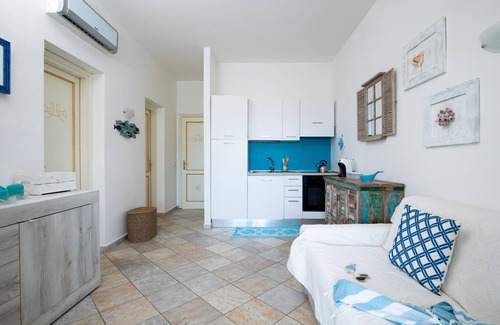 Pittulongu Apartment | Anemone Apartment with Terrace by Wonderful Italy