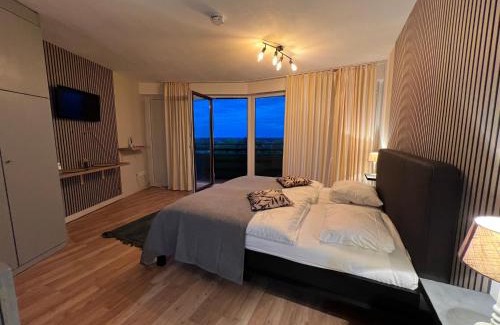Bad Essen Hotel | Apart-Hotelzimmer mit Bergblick in Bad Essen