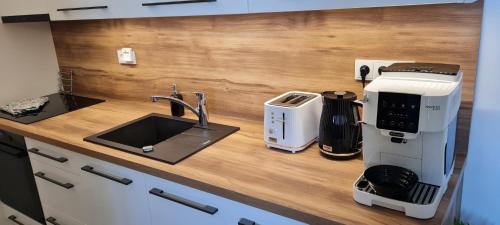 Krnov Apartment | Apartmán mezi stromy