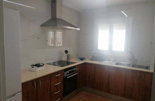 San Luis de Sabinillas Apartment | Apartment 'Sabinillas Front Line Beach' with Shared Pool, Wi-Fi and Air Conditioning