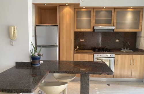 Lecherías Apartment | Apartment 5 minutes from the beach still life shopping center