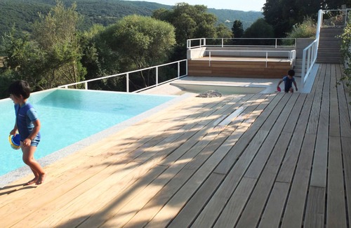 Aglientu Apartment | Apartment 'Barone Rampante' with Shared Pool, Private Garden and Air Conditioning