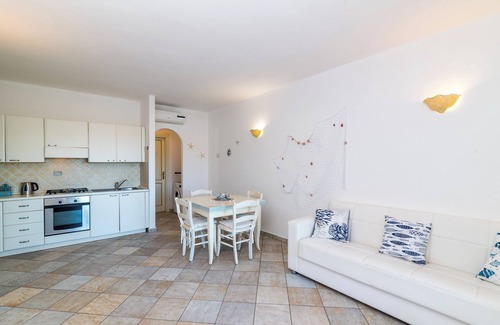 Pittulongu Apartment | Apartment 'Belvedere 18 - 3 Shared Pool' with Sea View, Private Terrace and Air Conditioning