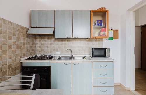 Solanas Apartment | Apartment 'Casa Rimedia' with Balcony, Wi-Fi and Air Conditioning