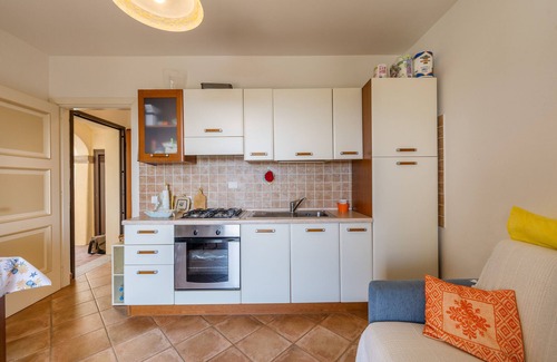 Murta Maria Apartment | Apartment 'Casa Vacanze Ananas' with Private Terrace, Private Garden and Air Conditioning